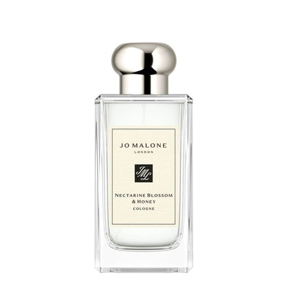 Nectarine Blossom & Honey Cologne Jo Malone London Nectarine Blossom & Honey is a vibrant and delectable Eau de Cologne that captures the essence of a sun-drenched orchard in full bloom. This fragrance beautifully balances the juicy sweetness of ripe nect